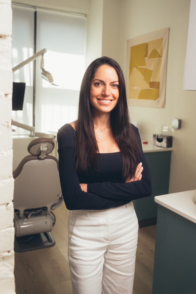 Dr. Daria Ameri standing in dental office at SMILELOUNGE in Brooklyn, NY